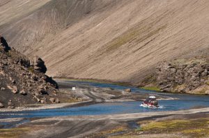 crossing the river with off road car